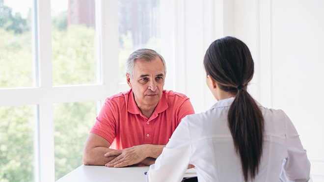 doctor talking to patient about mental health